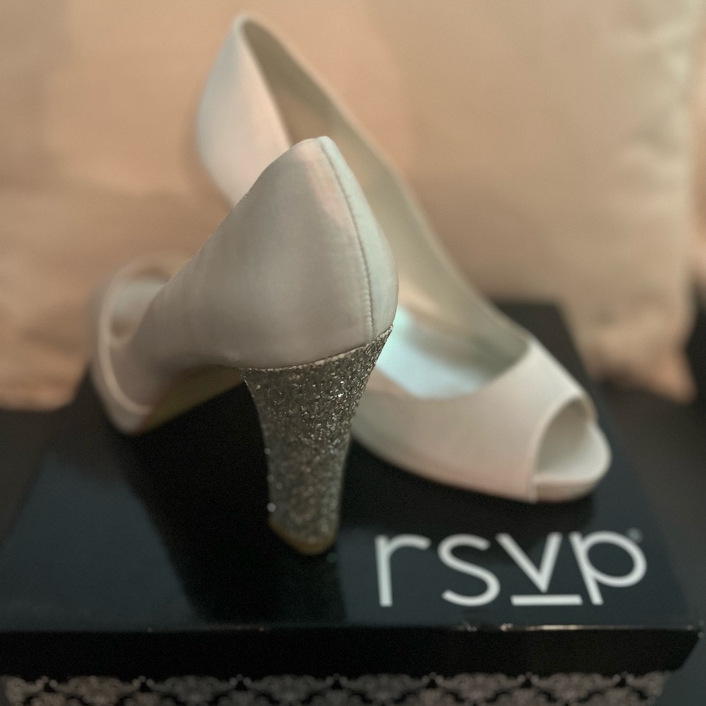 Beige gorgeous shoes with bling on the heels